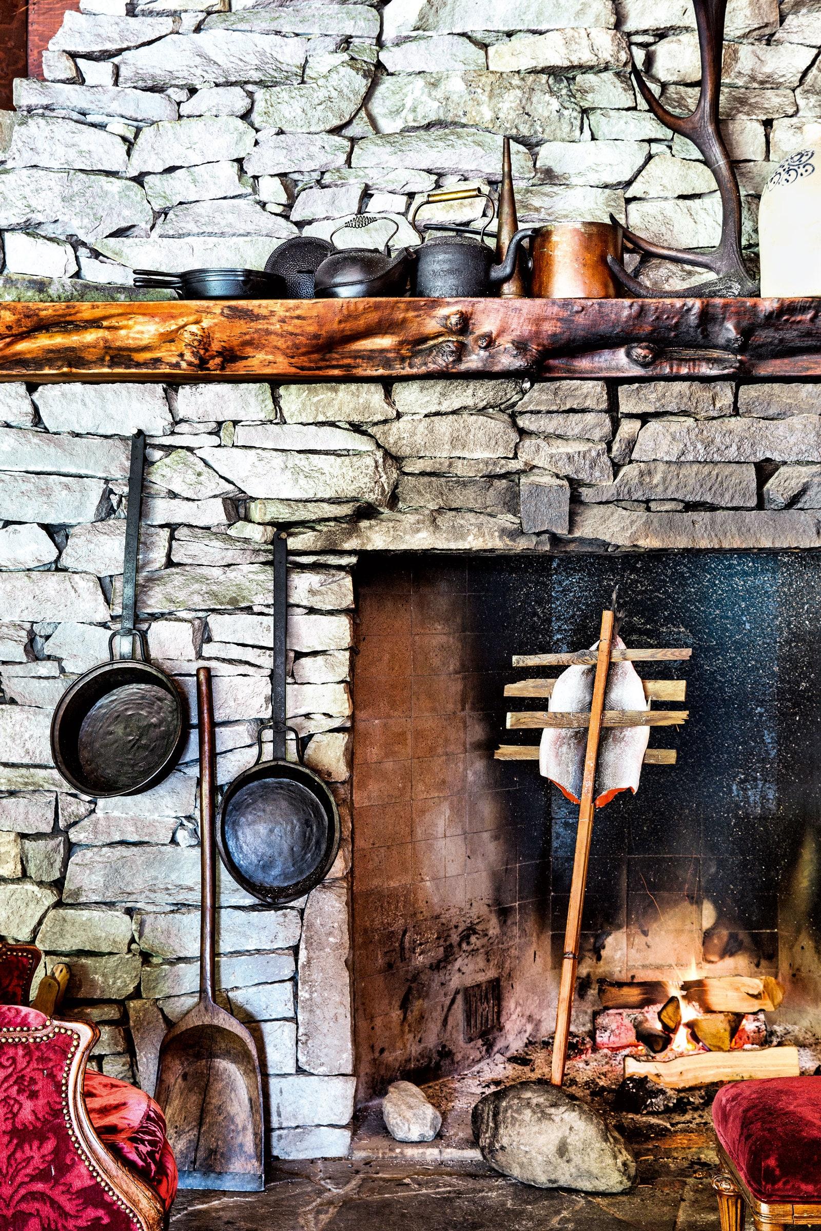 Smoking a salmon by the traditional method over a fire at Clayoquot