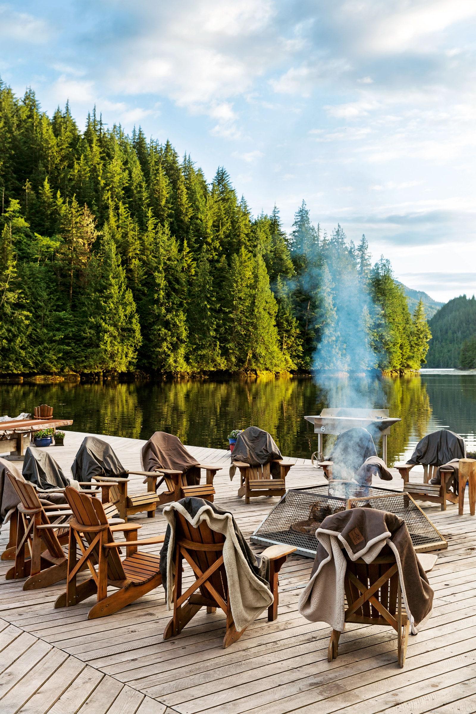 A smouldering firepit at Nimmo Bay Wilderness Resort