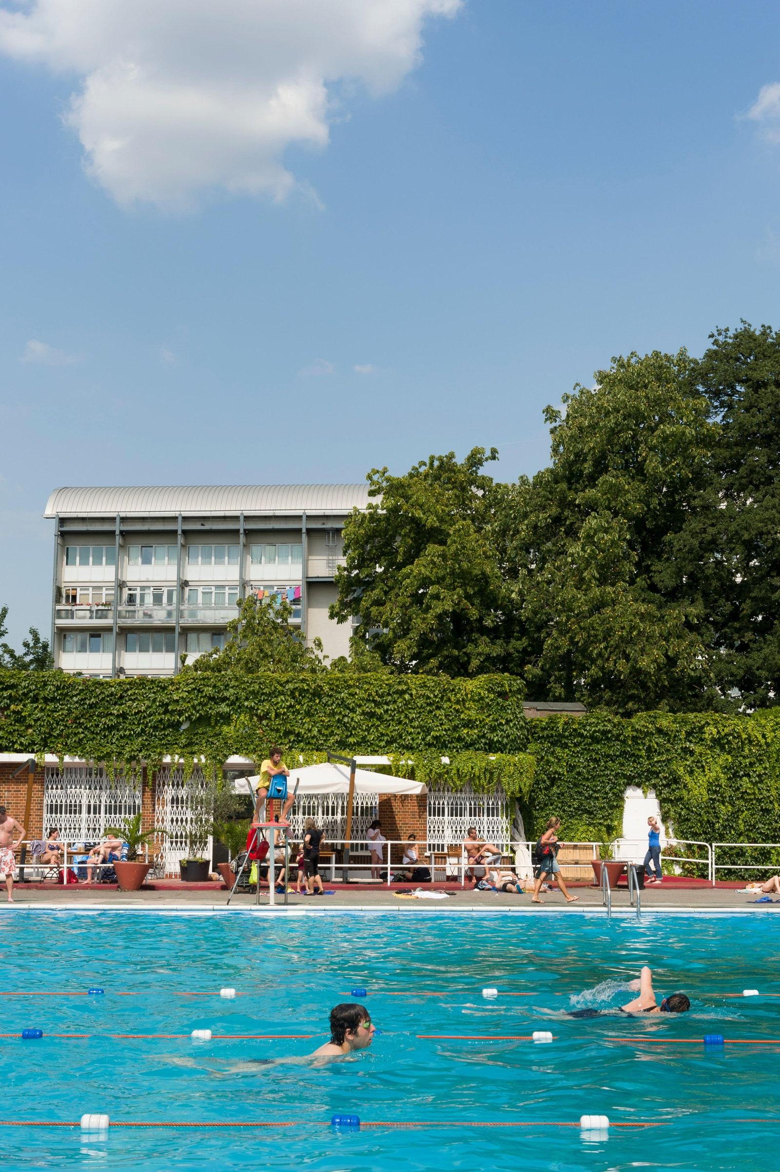 People swimming at Brockwell Lido Brockwell Park London